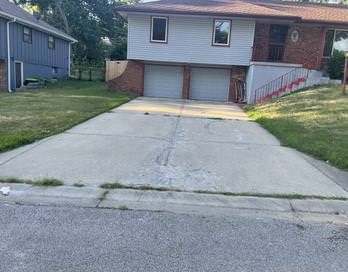 Cracked driveway before replacement